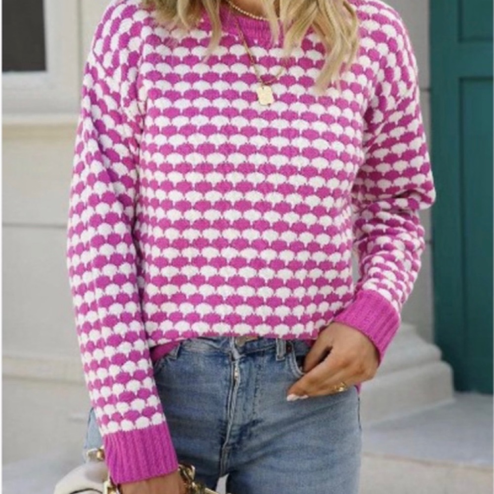 Ladies pink and white checked pullover sweater. 100%acrylic.